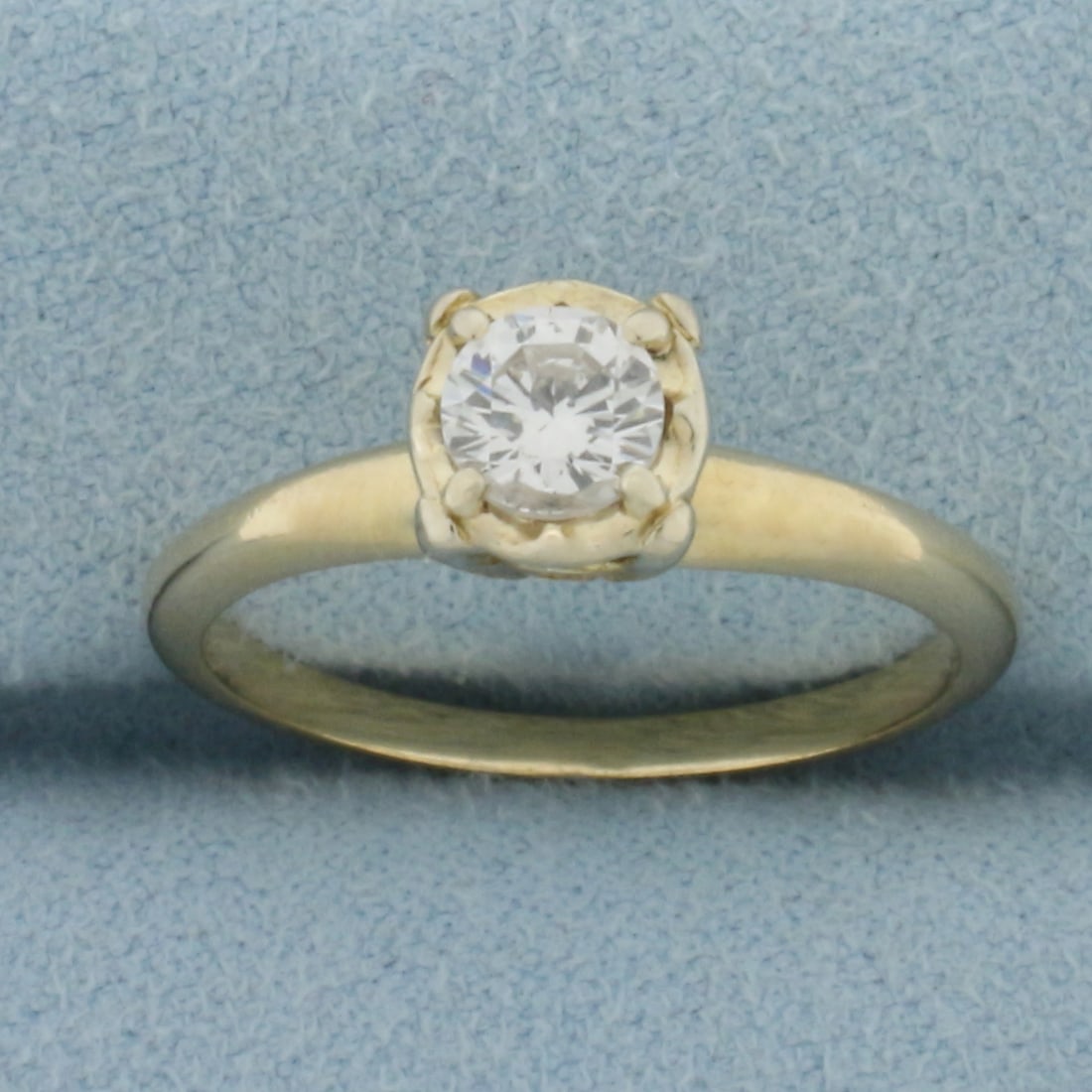 Diamond Solitaire Engagement Ring in 14k Yellow Gold: In 14k Yellow Gold. Contains one high quality 1/2ct round brilliant diamond, SI clarity/H color, eye clean, great cut for added brilliance. Size 8. 2.6g.