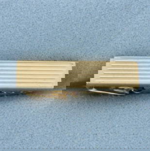 Vintage Tie Clip in 10k Yellow Gold: In 10k yellow gold. 7/8 inches long and 1/4 inch wide. 2.7g.