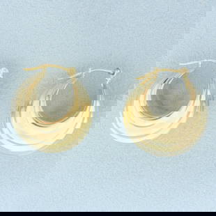Wide Hoop Earrings in 14k Yellow Gold: In 14k Yellow Gold. 3/4 inch long. 14mm wide at widest point. 3.7g.