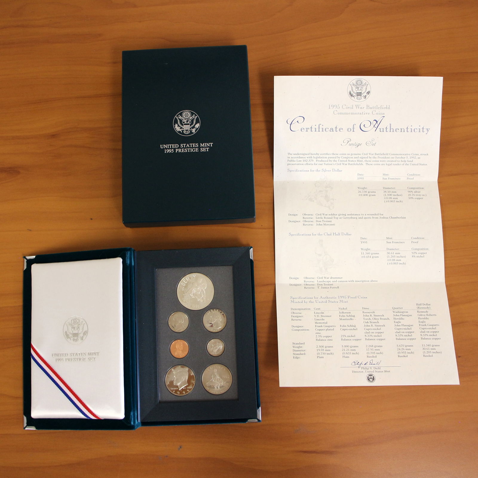 US Mint 1995 Civil War Battlefield Commemorative Proof Coin Prestige Set OGP: One 1995 U.S. Mint Civil War Battlefield Commemorative Coin Prestige Set that includes Proof U.S. Mint 90% Silver Dollar. Includes original packaging, casing, and CoA.