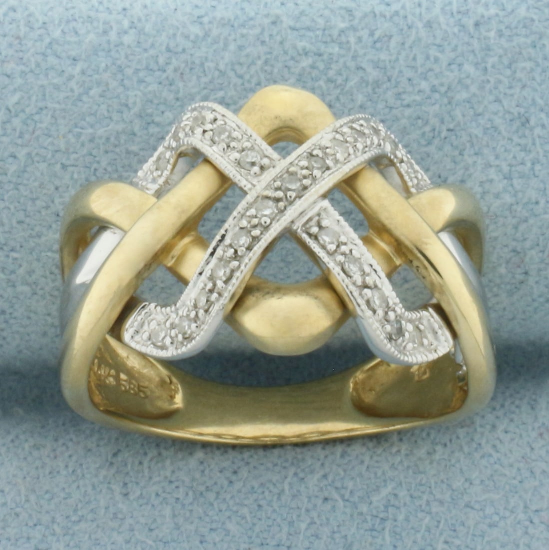 Diamond Woven Design Ring in 14k Yellow Gold: In 14k Yellow Gold. Contains twenty-three high quality 1/2pt diamonds. 14mm wide at center. Size 6.25. 5.1g.