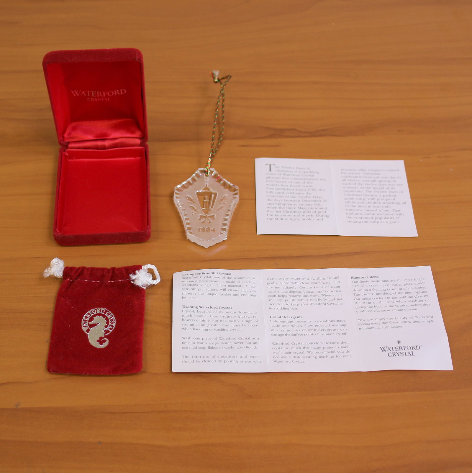 Waterford Crystal 1984 Christmas Ornament: Lantern with bow and holly. Original box, pouch, and papers included.