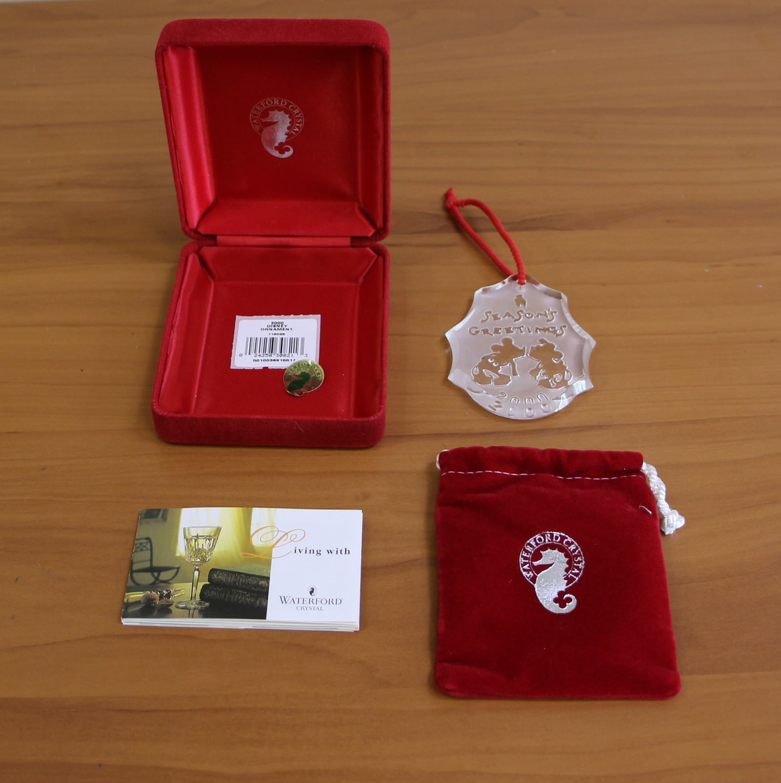 Waterford Crystal 2000 Season's Greetings Disney Mickey and Minnie Ornament: Season's Greetings. Mickey and Minnie Mouse. Original box, pouch, papers, Waterford sticker and tag included.