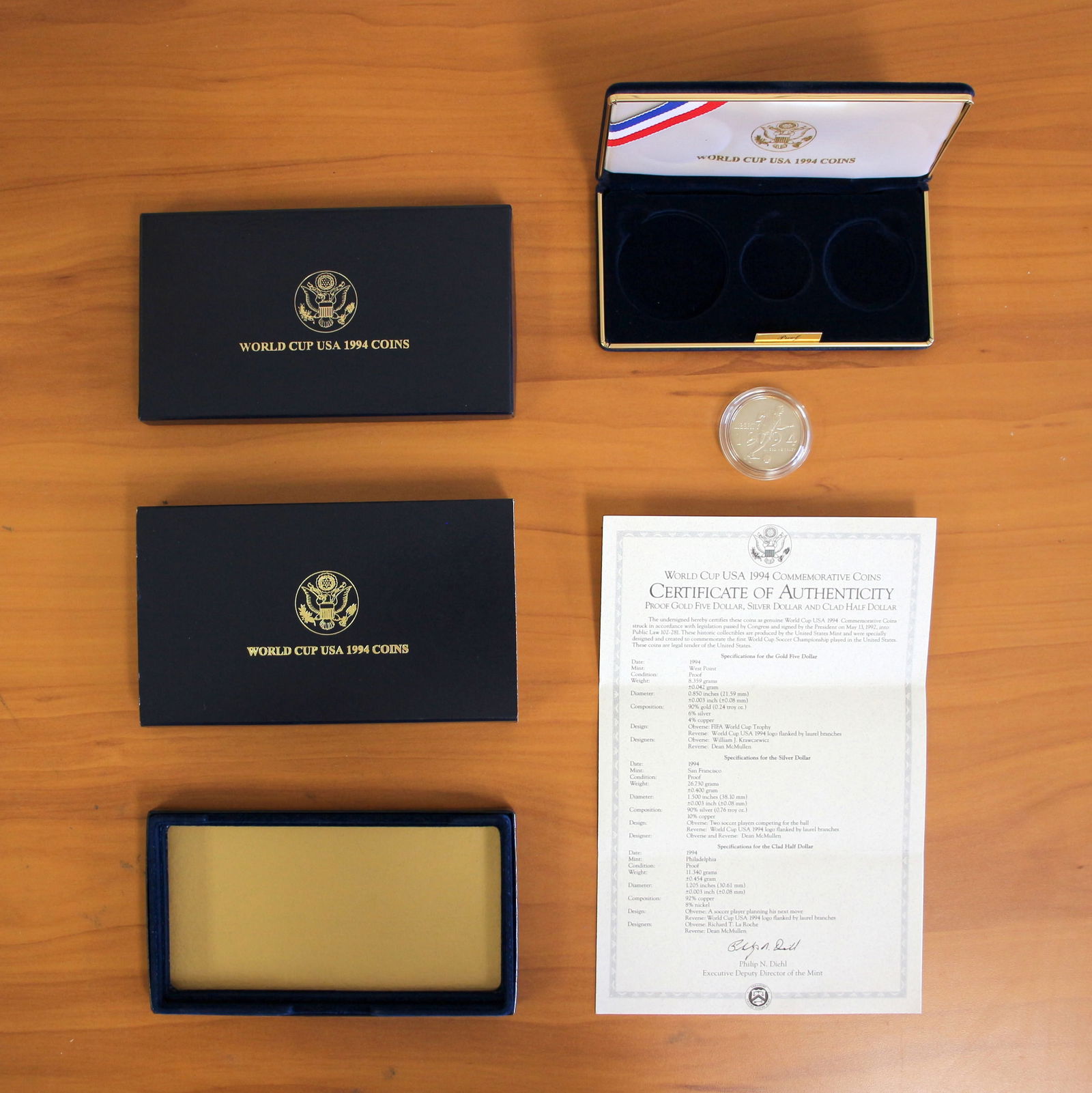 US Mint 1994 World Cup USA Commemorative Coin OGP: Contains one 1994 Clad Half Dollar, does not include other coins. Includes CoA, original packaging and box.