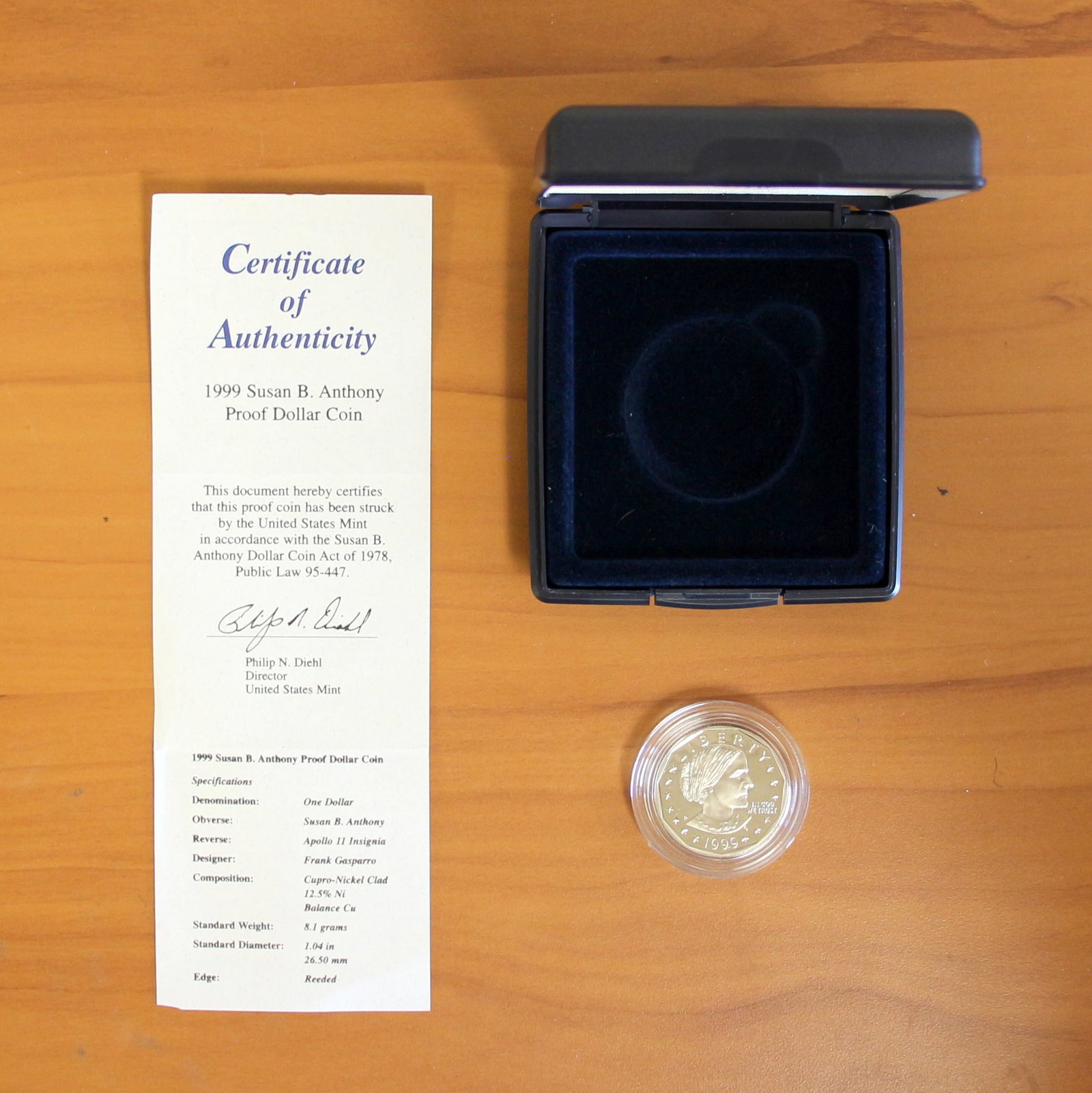 US Mint 1999 U.S. Mint Susan B. Anthony Proof Dollar Coin OGP: Contains one 1999 Susan B. Anthony Proof Dollar Coin. Includes CoA and original packaging.