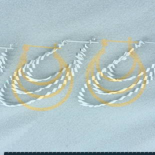 Diamond Cut Triple Hoop Earrings in 14k Yellow Gold: In 14k Yellow Gold. 1 1/8 inch long. 1 inch wide. Leverbacks. 2.8g.