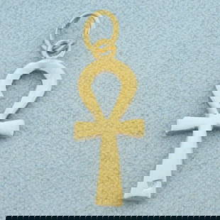 Egyptian Ankh Charm or Pendant in18k Yellow Gold: In 18k Yellow Gold. 7/8 inch long. 3/8 inch wide at widest. 1.3g.