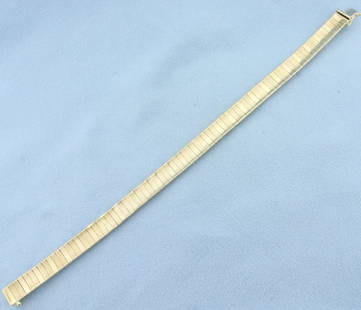 Omega Link Bracelet in 14k Yellow Gold: 14k yellow gold. 7 inches long, 7.75mm wide. Safety clasp. 21.8g.