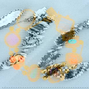 Vintage Gemstone Large Slide Charm Bracelet in 14k Yellow Gold: In 14k Yellow Gold. Contains: 14mm Agate gemstone, 9.5x5mm Opal gemstone with intense play of color, 10mm Rose shaped Coral gemstone, 15mm hand painted left gaze female cameo, 12.5mm Jade gemstone, 12