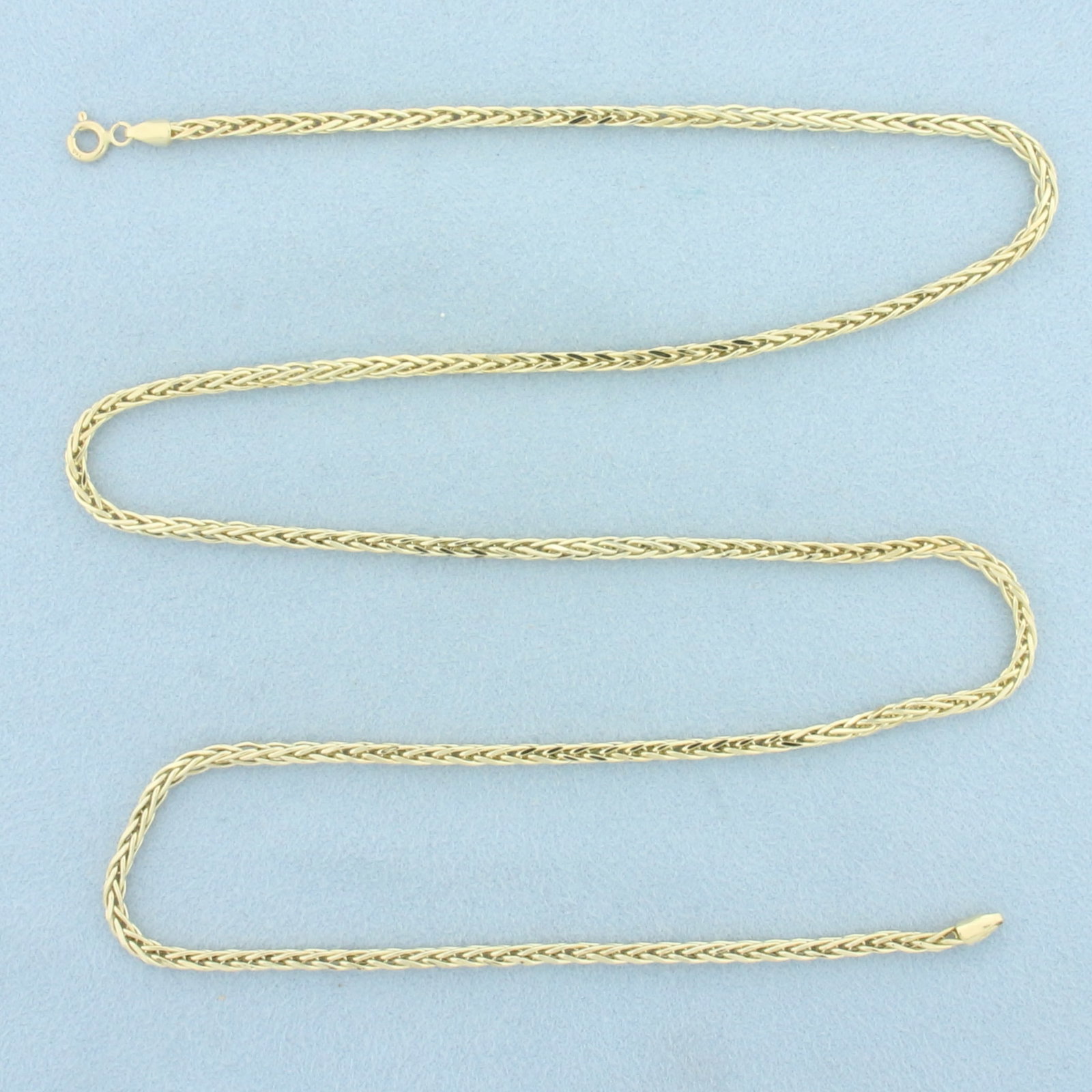 23 Inch Foxtail Link Chain Necklace in 18k Yellow Gold: In 18k Yellow Gold. 23 inches long. 2mm wide. Spring clasp. 8.6g.