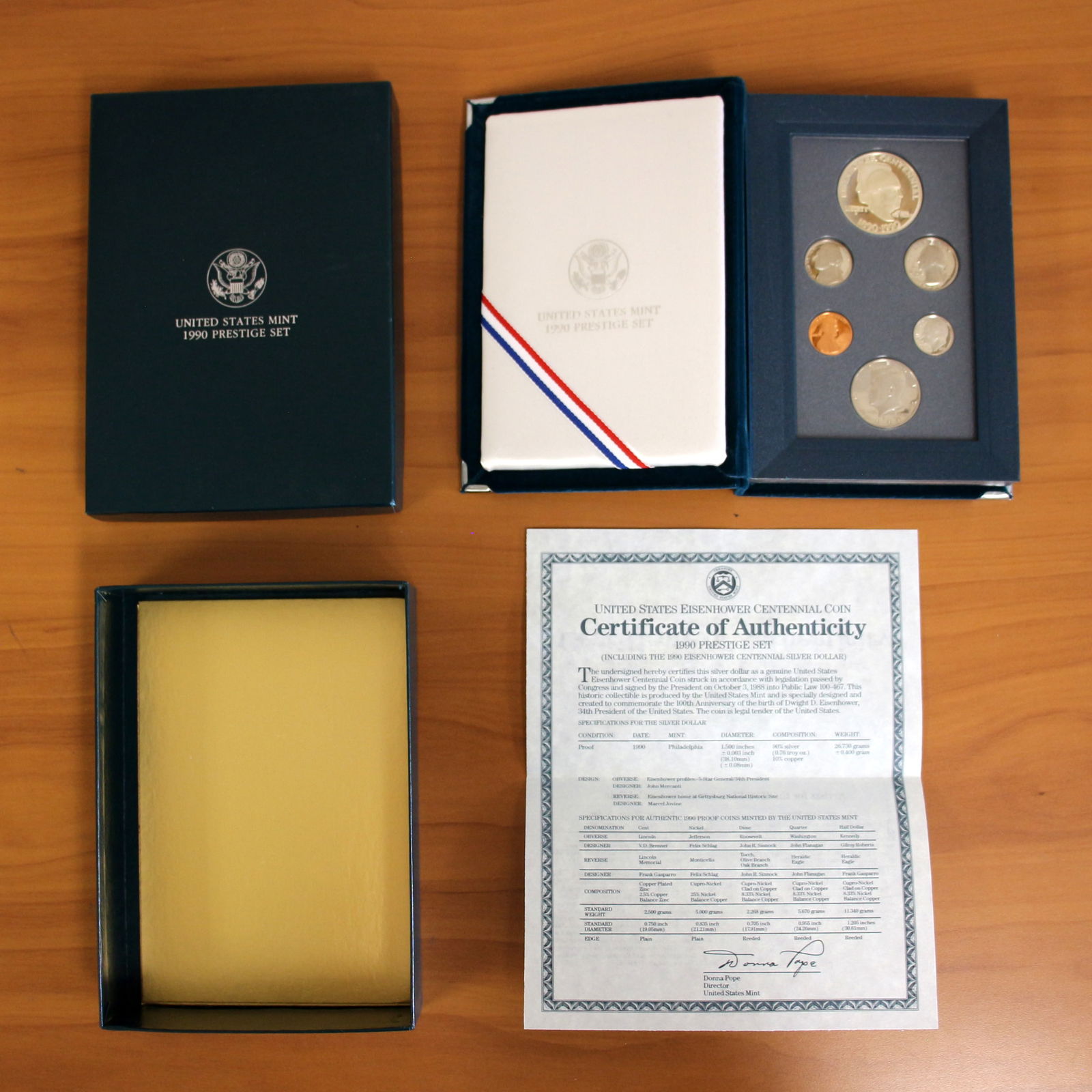 US Mint 1990 Eisenhower Centennial Proof Coin Prestige Set OGP: One 1990 U.S. Mint Eisenhower Centennial Coin Prestige Set that includes Proof 1990 90% Silver Eisenhower Centennial Silver Dollar. Includes CoA, original packaging and casing.