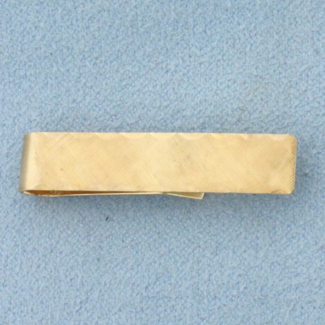 Vintage Etched Tie Bar Clip in 14k Yellow Gold: In 14k Yellow Gold. 1 1/4 inch long. 1/4 inch wide. 1.9g.