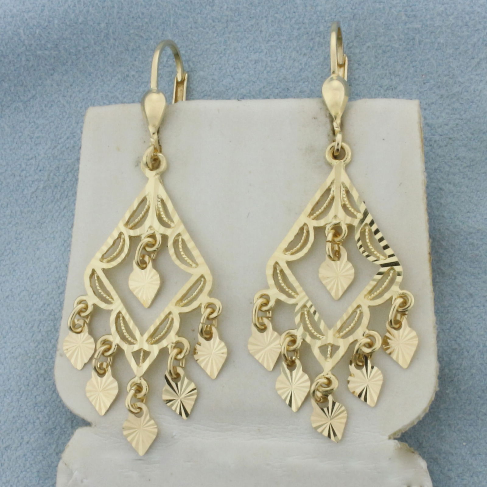 Dangle Chandelier Earrings in 14k Yellow Gold: In 14k Yellow Gold. 1 3/4 inch long. 3/4 inch wide. Leverbacks. 4.4g.