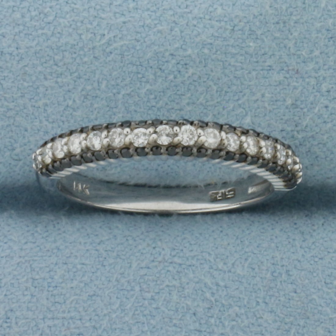 Effy Black and White Diamond Band Ring in 14k White Gold: In 14k White Gold. Contains seventeen high quality .01ct "white" diamonds, SI clarity/G color. Also contains fifty high quality 1/2pt black diamonds.. 3mm wide a top. Size 7. 3.0g..