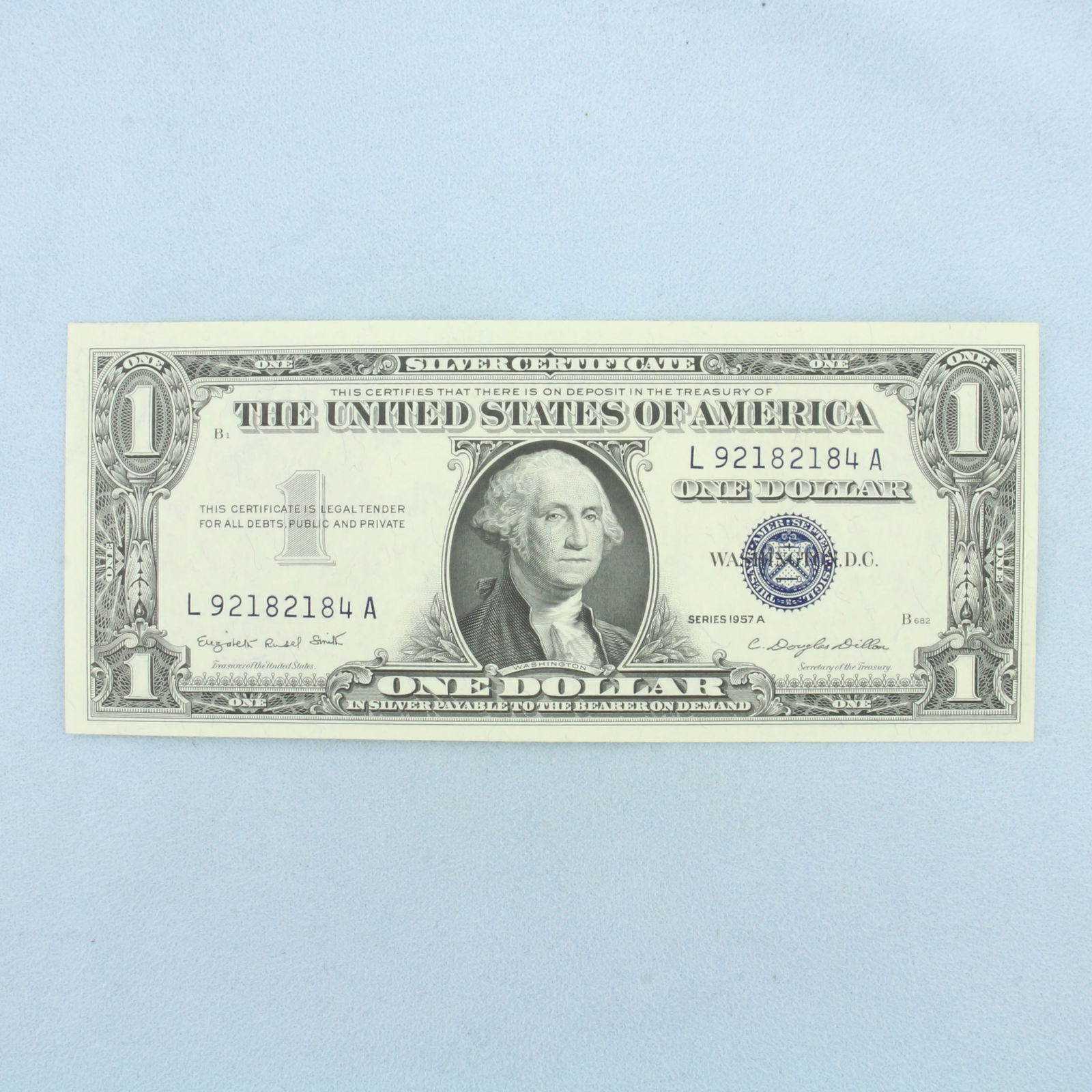 1957 $1 Crisp Uncirculated Silver Certificate Blue Seal Bill: $1 One Dollar Silver Certificate in crisp uncirculated condition. No rips or tears or folds on note, crisp.