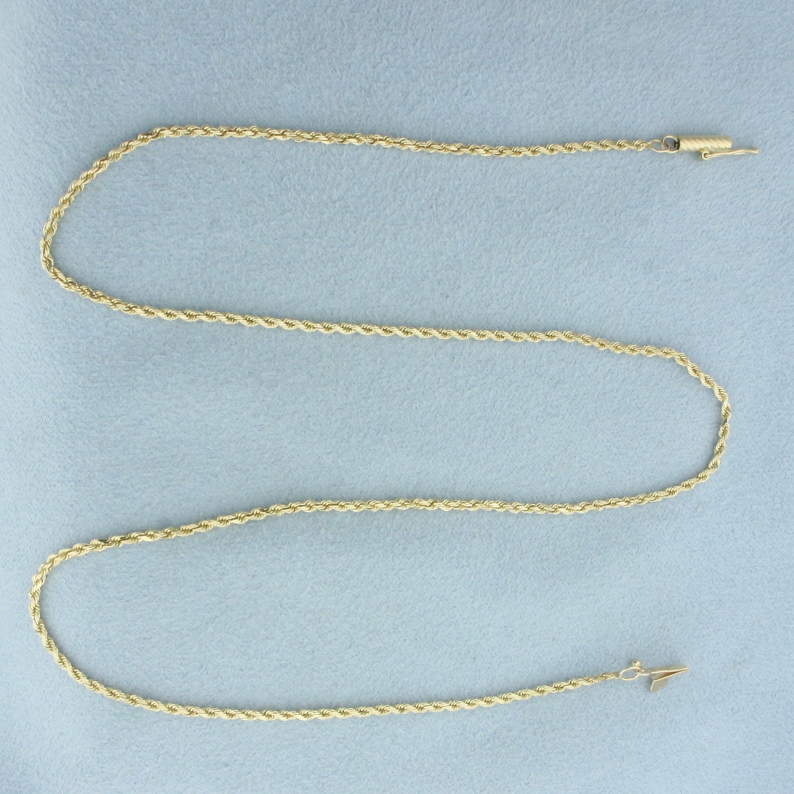 16 Inch Rope Link Chain Necklace in 14k Yellow Gold: In 14k Yellow Gold. 16 inches long. 1.2mm wide. Barrel clasp with safety clasp. 3.6g.