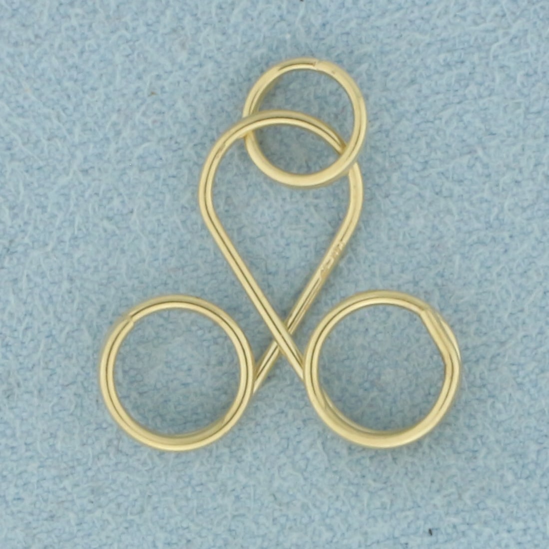 Charm Holder Pendant in 14k Yellow Gold: In 14k Yellow Gold. 3/4 inch long including jump ring. 3/4 inch wide. "Key chain" design so can attach charms without cutting bales and soldering on, just slide them on. .9g.