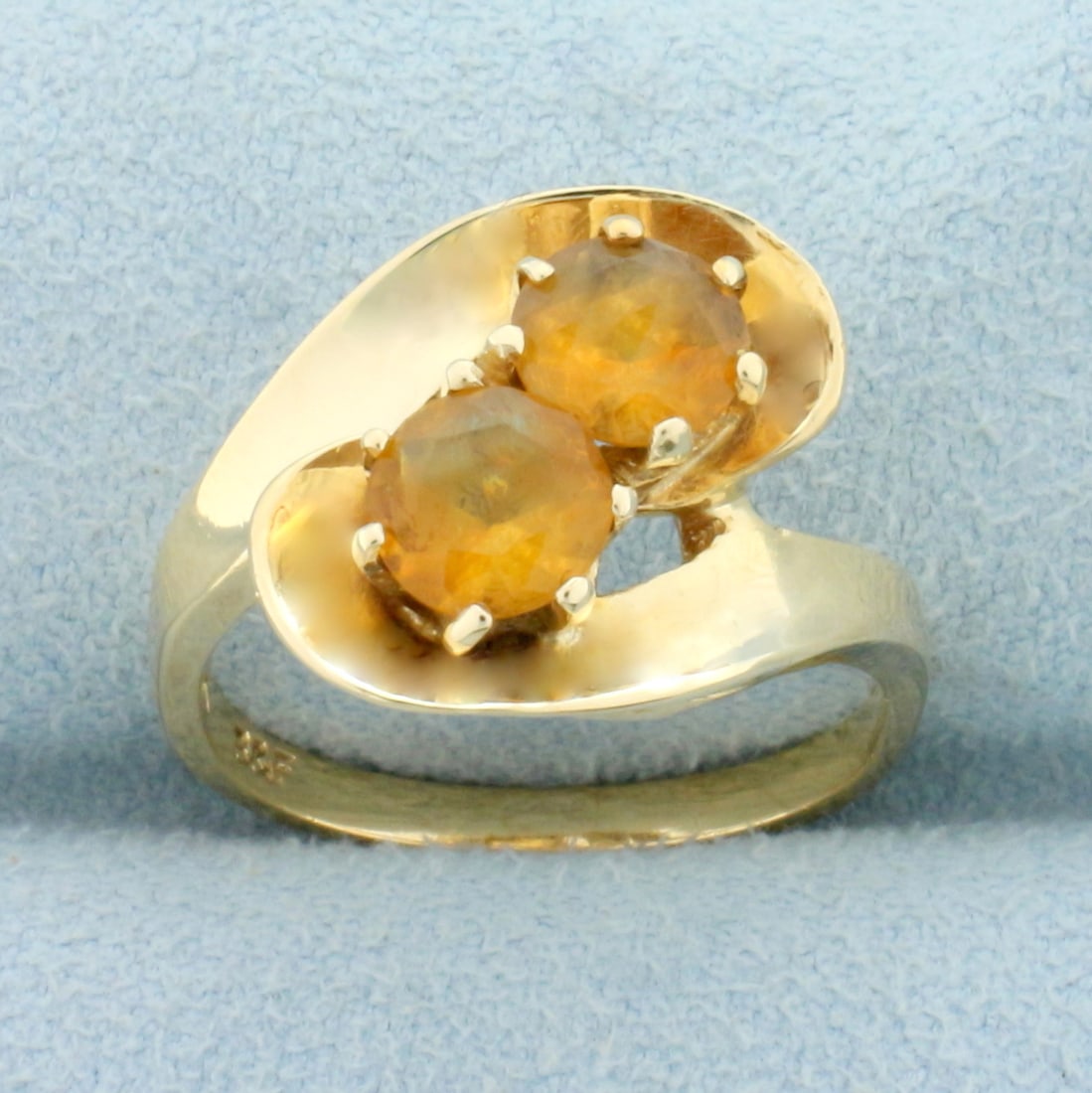 Golden Citrine Toi et Moi Ring in 14K Yellow Gold: In 14K Yellow Gold. Contains two high quality natural 6mm round Citrine gemstones with fantastic golden color and excellent clarity. Size 6 1/4. 4.5g.