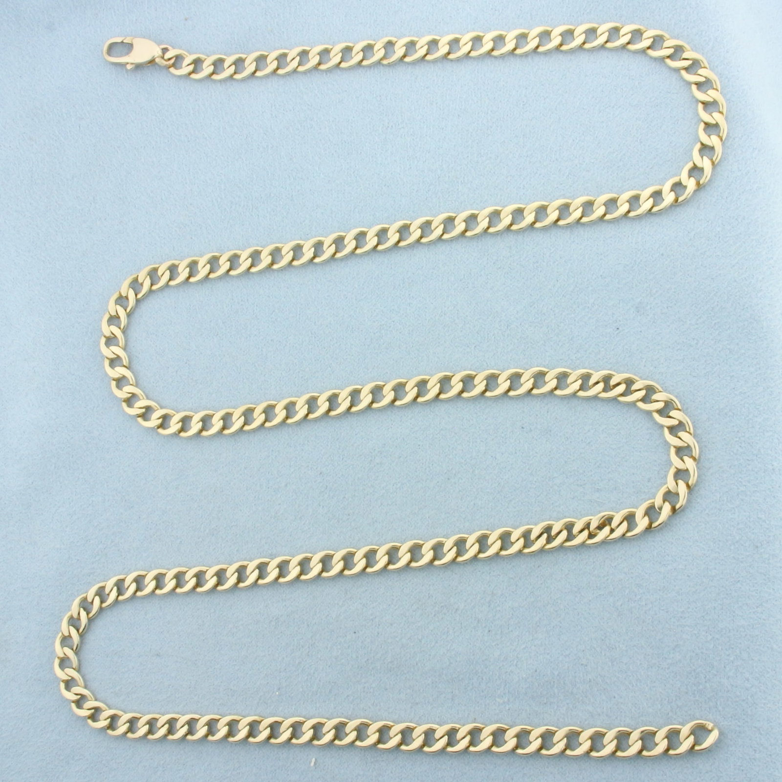 Mens 27 Inch Curb Link Chain Necklace in 14k Yellow Gold: In _k Yellow Gold. 27 inches long. 5.2mm wide. Lobster clasp. 36.0G