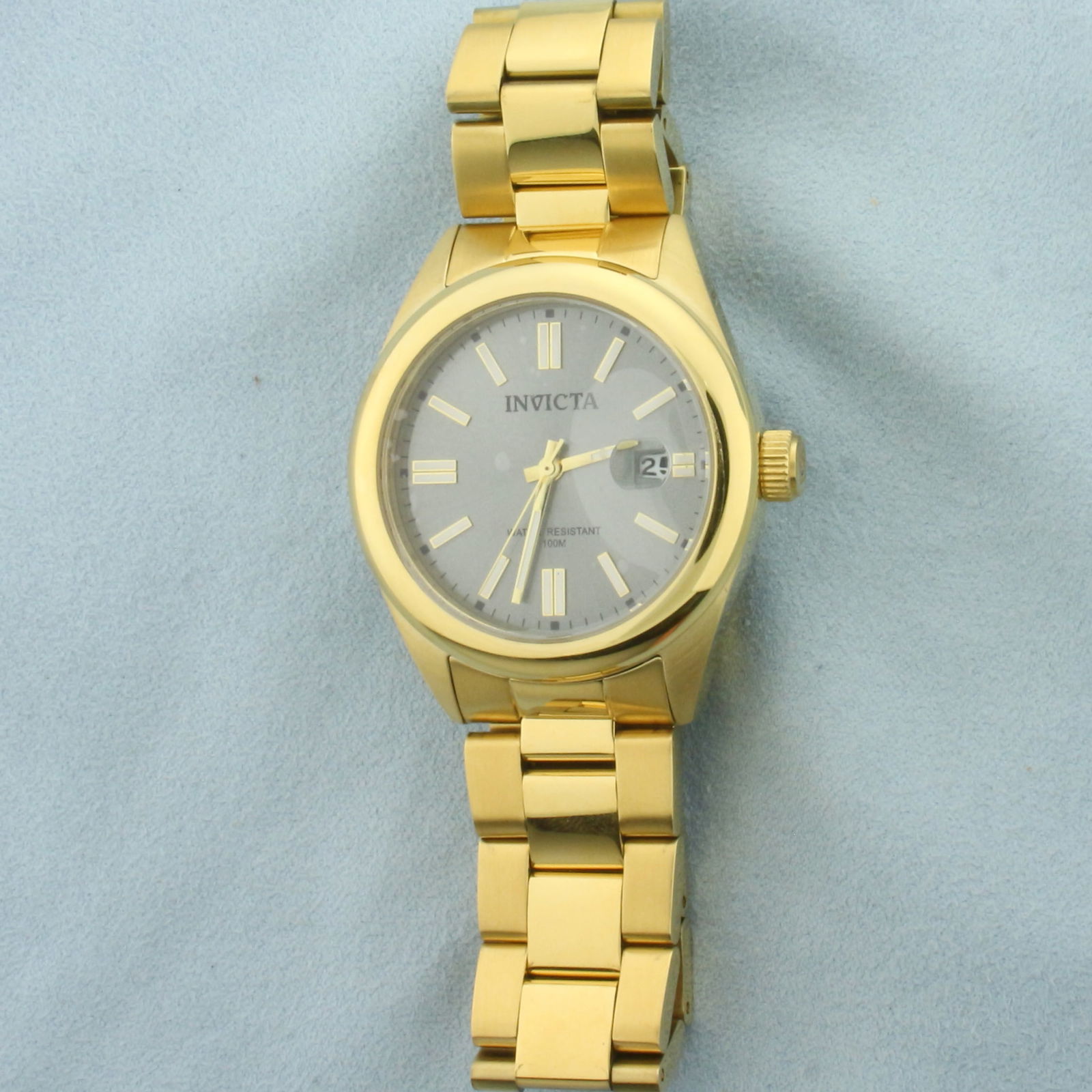 New Mens Invicta 38481 Pro Diver World Yacht Men's Watch: In Gold Tone Stainless Steel. Model #38481. 100 meter water resistant. Silver dial. New condition, original plastic film still on crystal. Includes box and extra link. Movement runs great, new battery