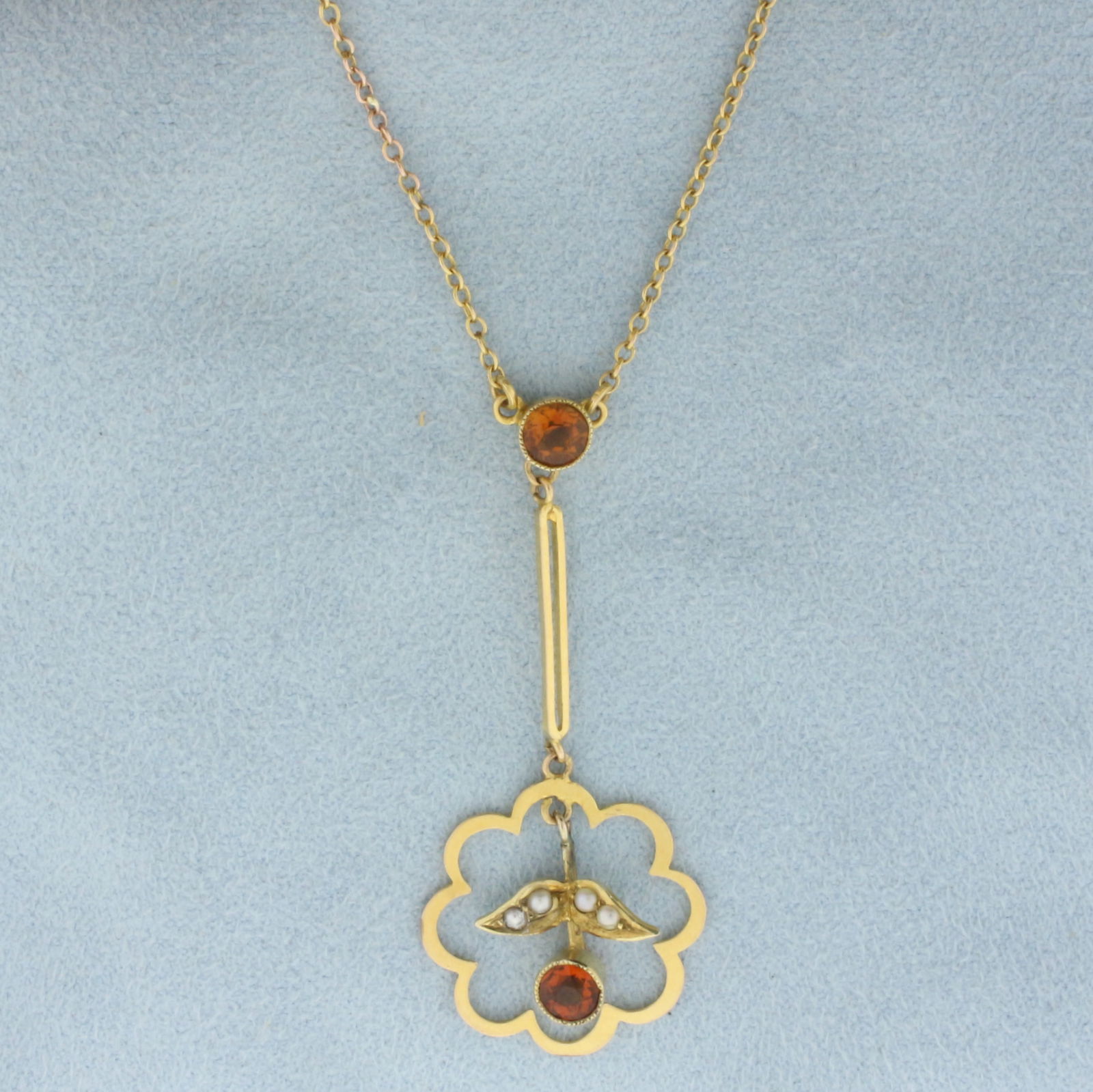 Antique Citrine and Seed Pearl Lavalier Necklace in 10k Yellow Gold: In 10k Yellow Gold. Contains two 4.5mm high quality natural Citrine gemstones, with intense color and excellent clarity. Also contains four high quality seed pearls. Pendant is 1 5/8 inch by 3/4 inch