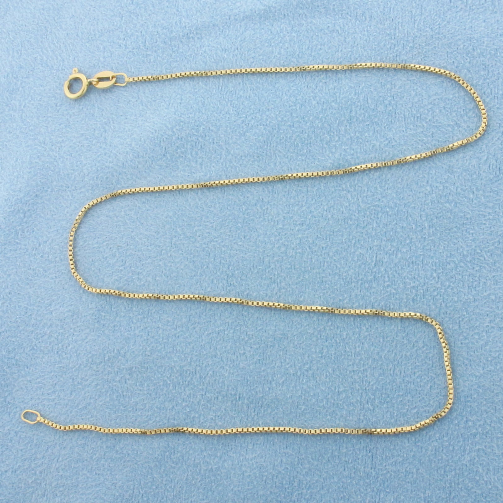 Italian 15 Inch Box Link Chain Necklace in 14k Yellow Gold: In 14k Yellow Gold. 15 inches long. 1.1mm wide. Made in Italy. Spring clasp. 2.4g.