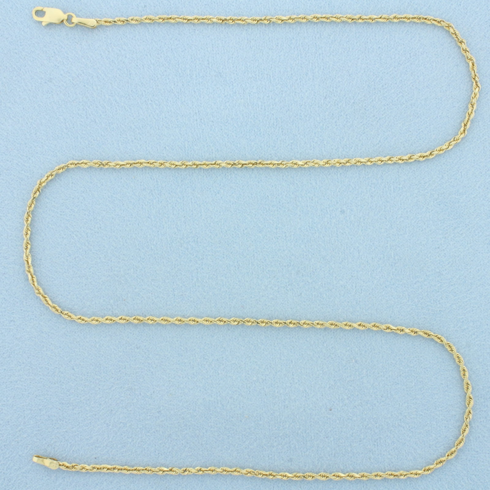 19 Inch Rope Link Chain Necklace in 14k Yellow Gold: In 14k Yellow Gold. 19 inches long. 1.7mm wide. Lobster clasp. 4.7g.