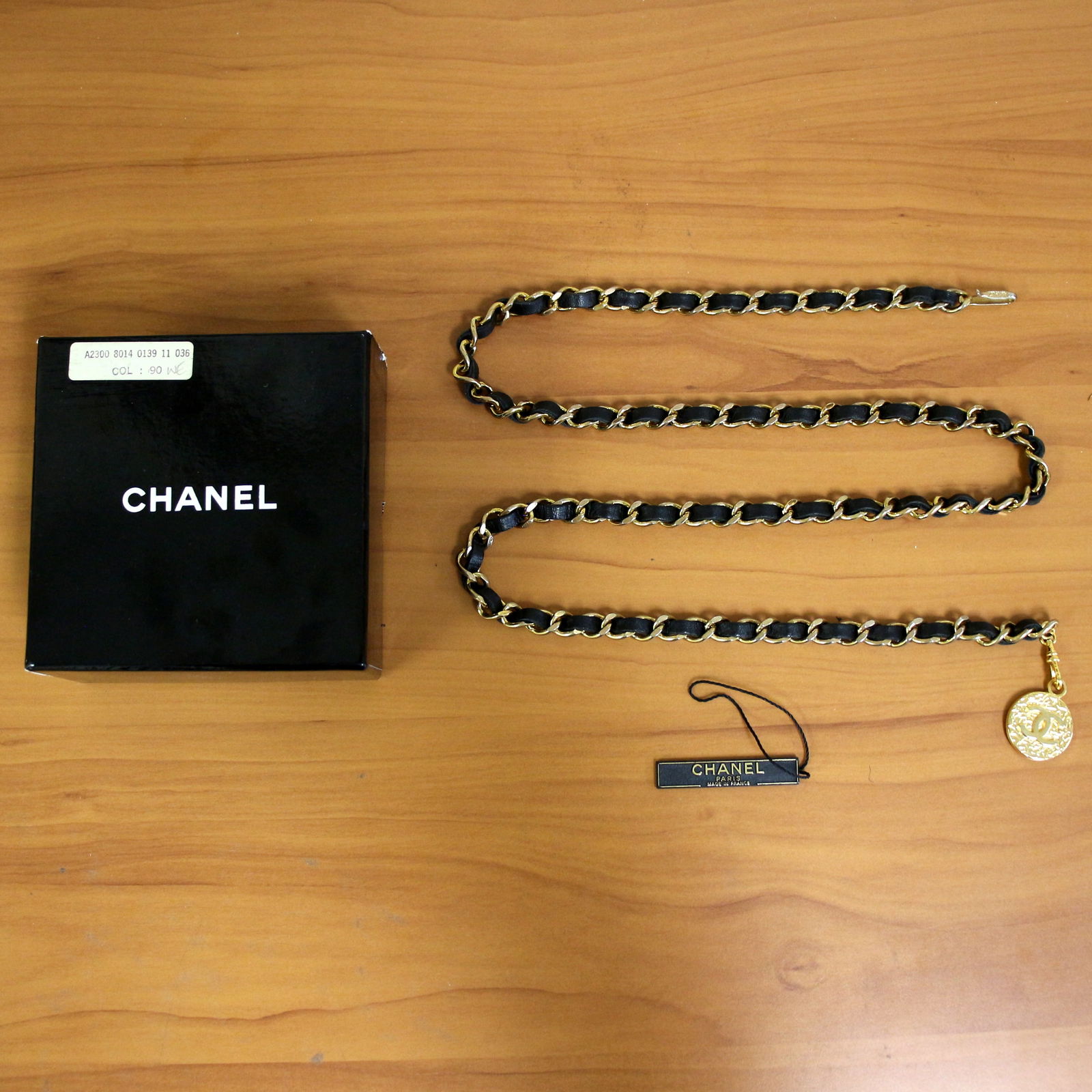 Chanel 1982 CC Logo Chain 90 CM Belt: From the 1982 collection. Iconic black leather classic CC medallion chain belt. Size 90. Original box and tag included. #A2300 8014 0139 11 036