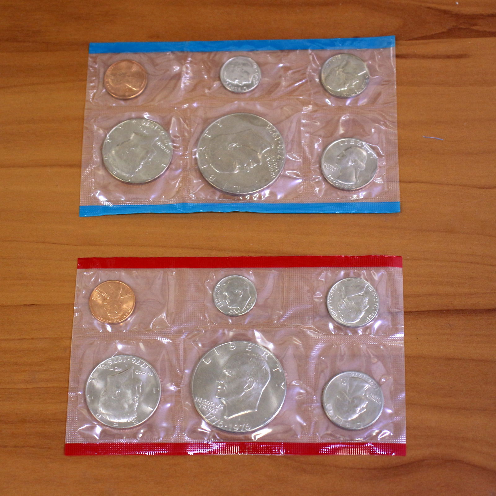 1976 US Mint Bicentennial Coin Sets Denver AND Philadelphia Mint OGP: Contains one 1976 uncirculated bicentennial Denver Mint 6-Coin set and one 1976 uncirculated bicentennial Philadelphia Mint Silver Dollar 6-Coin set. OGP