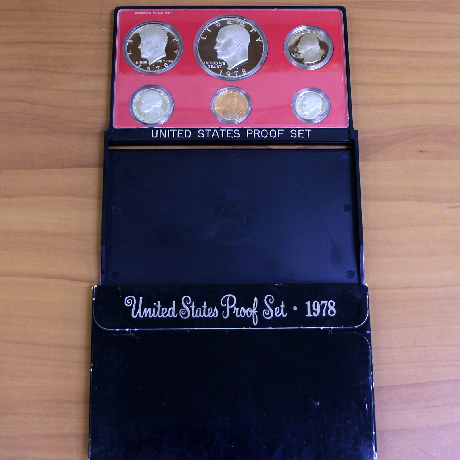 1970s US Mint Proof Coin Set OGP: Contains one set from 1975-1978. In original government packaging and box.