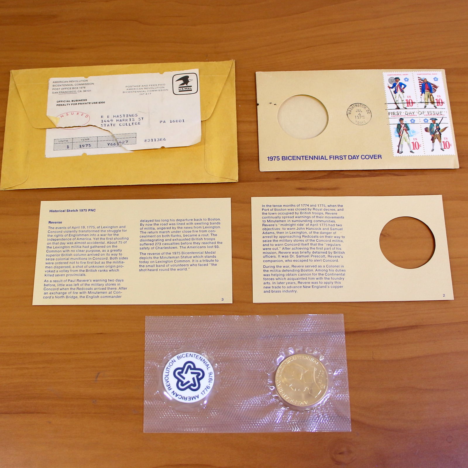1975 Bicentennial First Day Cover Coin: Contains one 1975 Bicentennial First Day Cover Coin. Set in plastic casing and contains original envelopes.