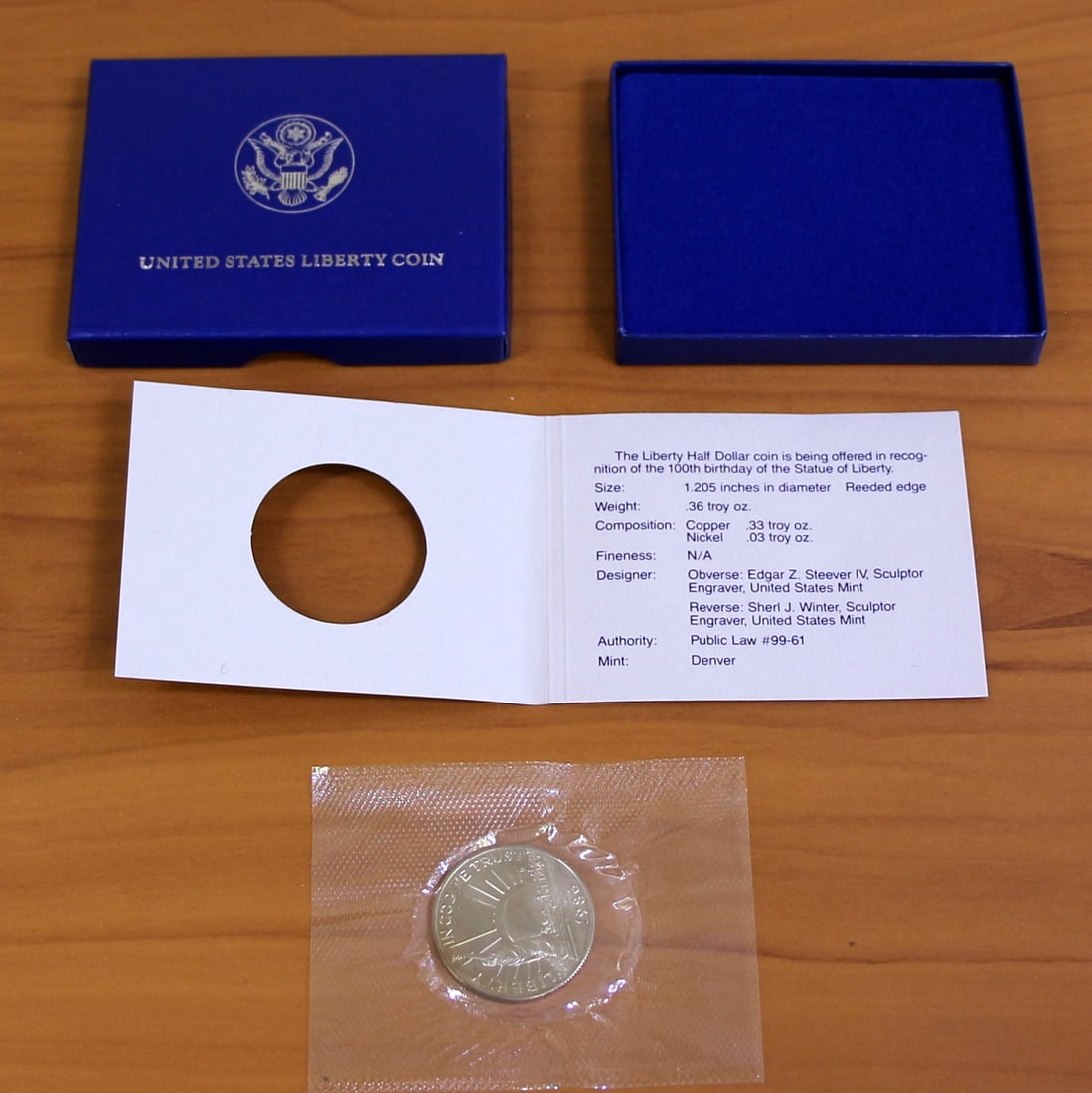1986 US Mint Liberty Proof Half Dollar Coin OGP: Contains one 1986 Liberty Uncirculated Proof Half Dollar. Set in original government packaging and contains certificate of authenticity.