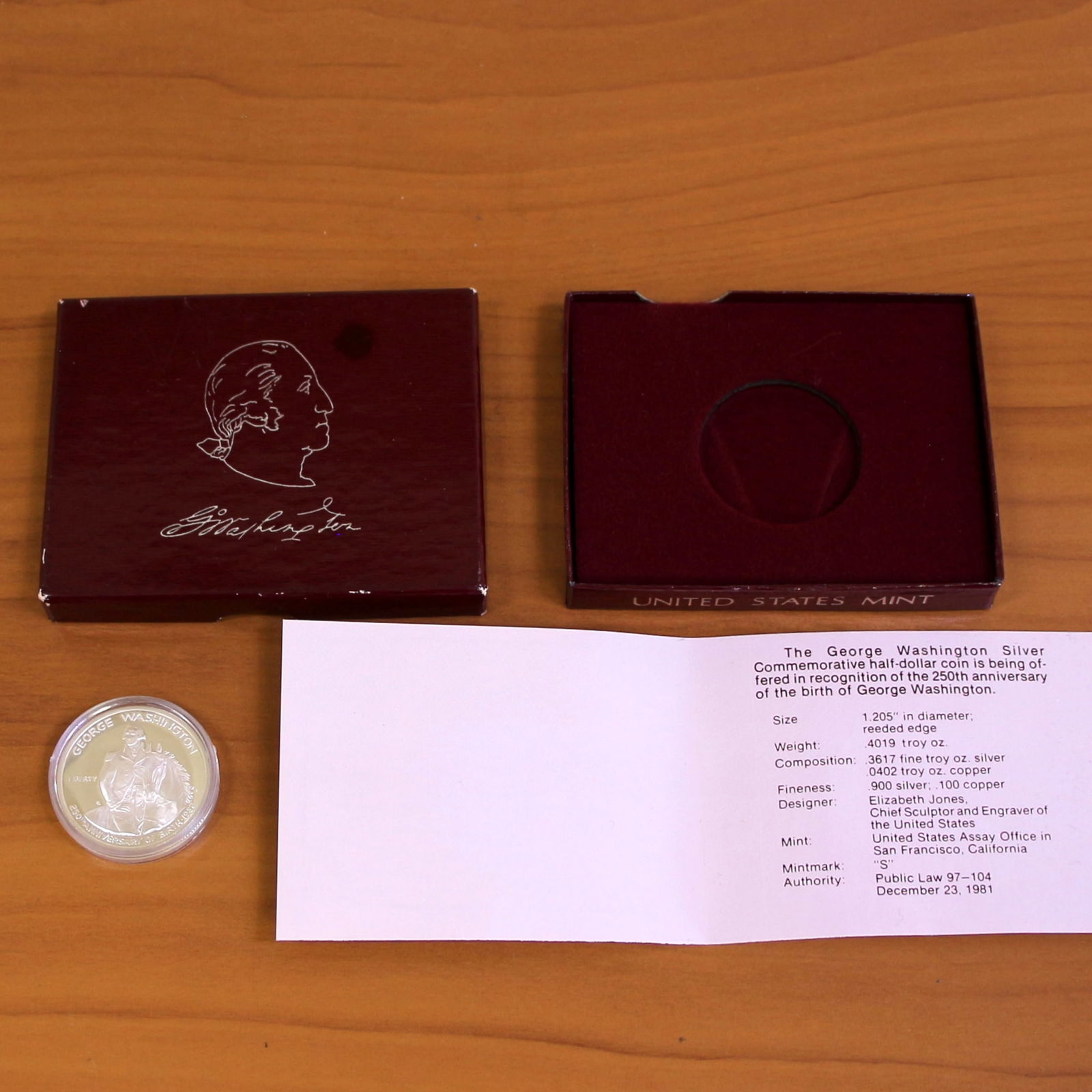 US Mint George Washington Proof Silver Half Dollar Coin OGP: Contains one 1732-1982 250th Anniversary of George Washington's Birth Commemorative Silver Uncirculated Proof Coin. Set in original government packaging and contains certificate of authenticity. 1