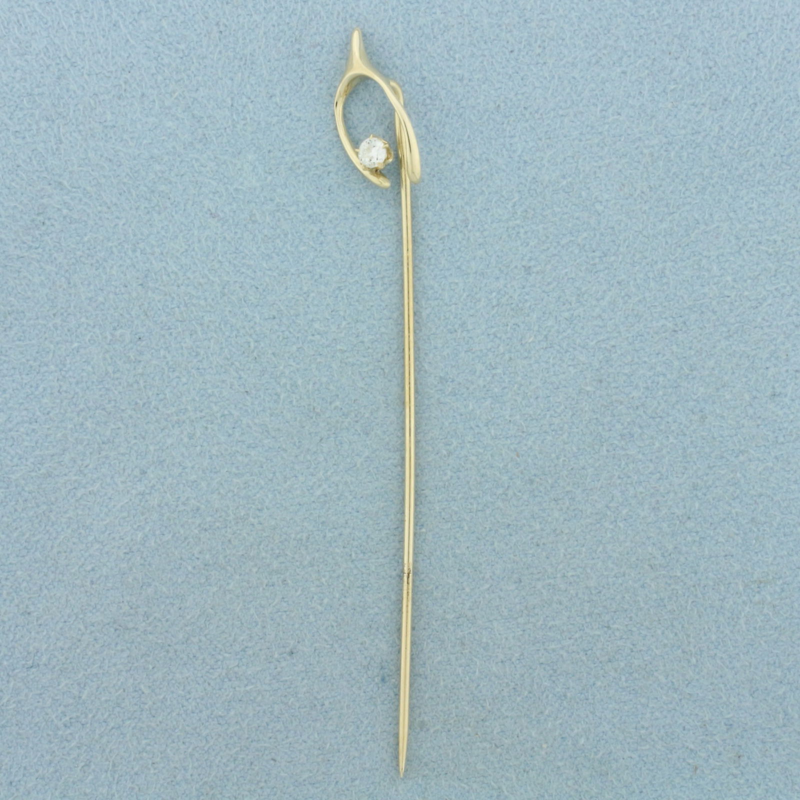 Vintage Diamond Wishbone Stick Pin in 14k Yellow Gold: In 14k Yellow Gold. Contains one .08ct high quality diamond, VS clarity/H color. 2 5/8 inches long. 1/4 inch wide. 1.1g.