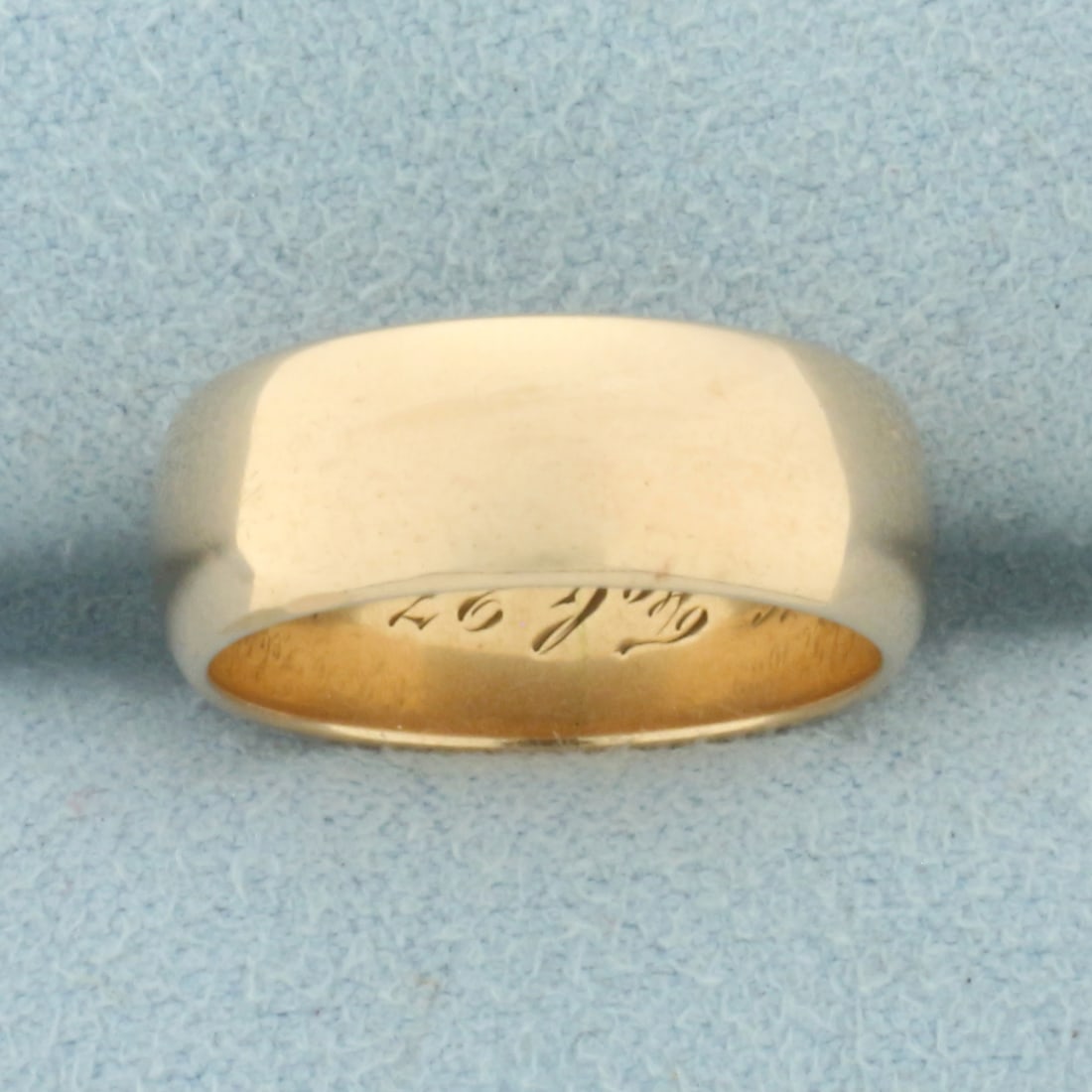 Antique 1889 High Polish Half Dome Wedding Band in 14k Yellow Gold: In 14k Yellow Gold with rose undertone. 6.5mm wide. Antique hand engraving on inside (can be removed). Size 5 1/2. 5.9g.