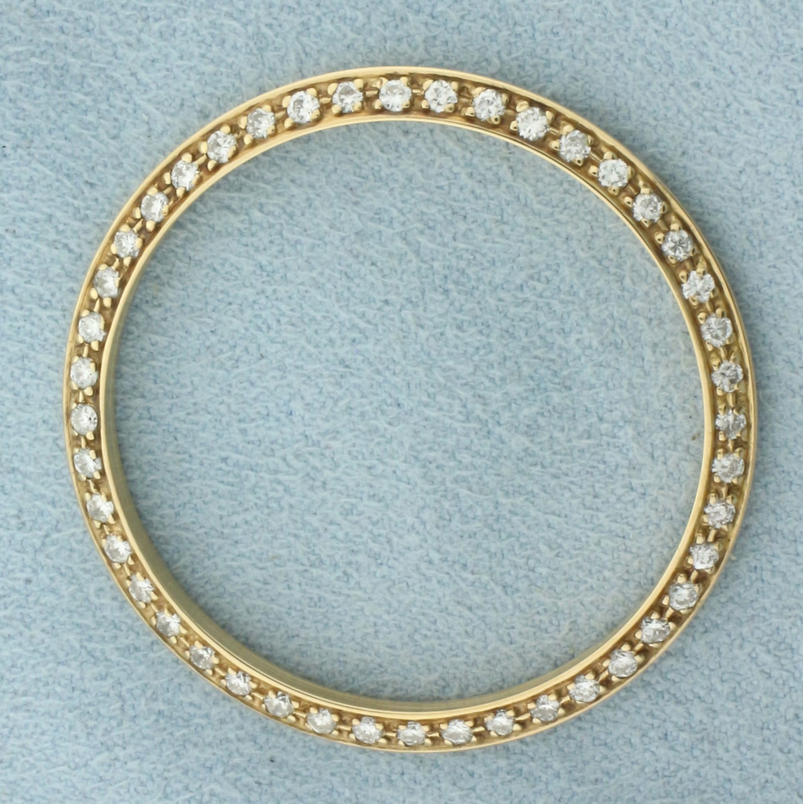 Aftermarket Rolex Diamond 36mm Bezel in 18k Yellow Gold: In 18k Yellow Gold. Contains forty-four high quality diamonds, 1ct TW, VS clarity/G color. 36mm diameter. Compatible with Day Date 36mm watches (i.e. Model 18038 Presidential). 5.8g.