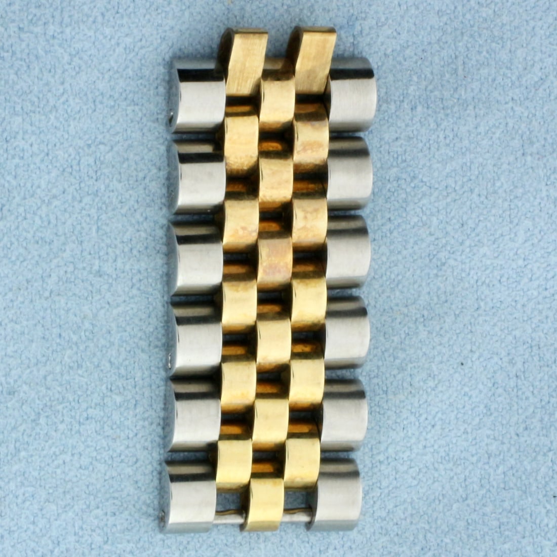 Six Genuine Rolex Jubilee Bracelet Links in Stainless Steel and 18k Yellow Gold: In Stainless Steel and 18k Yellow Gold. Contains six original Rolex jubilee links. 15.5mm wide.