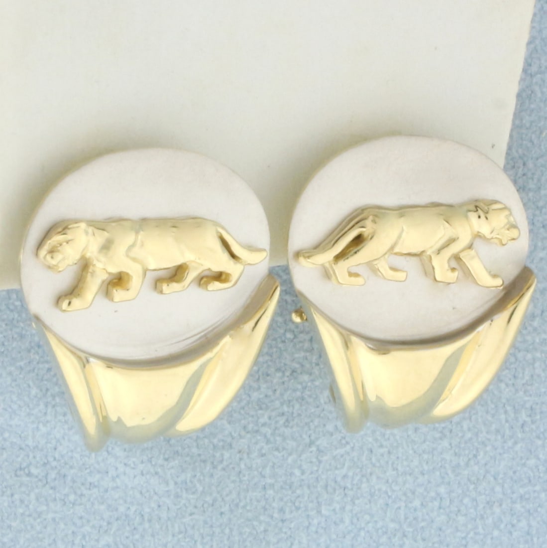 Panther Half Hoop Earrings in 14k Yellow and White Gold: In 14k yellow and white gold. Approx. 3/4 inches high x 3/4 inches wide. Omega backs. 14.8g.