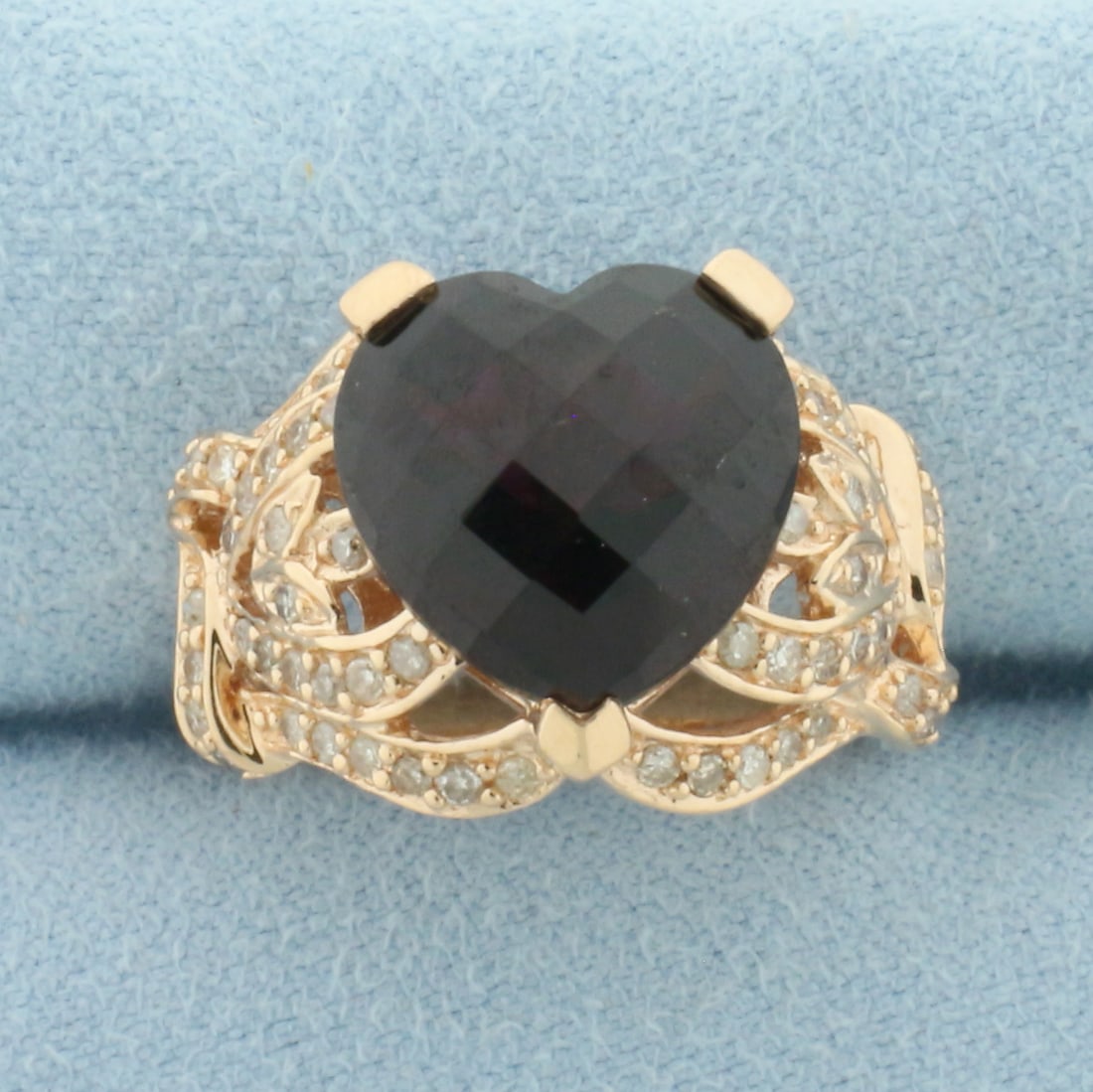 Heart Garnet and Diamond Ring in 14k Rose Gold: In 14k Rose Gold. Contains one 12x12mm approximately 8ct high quality fancy checkboard cut natural Garnet gemstone, with intense color and excellent clarity. Also contains seventy high quality 1/2pt