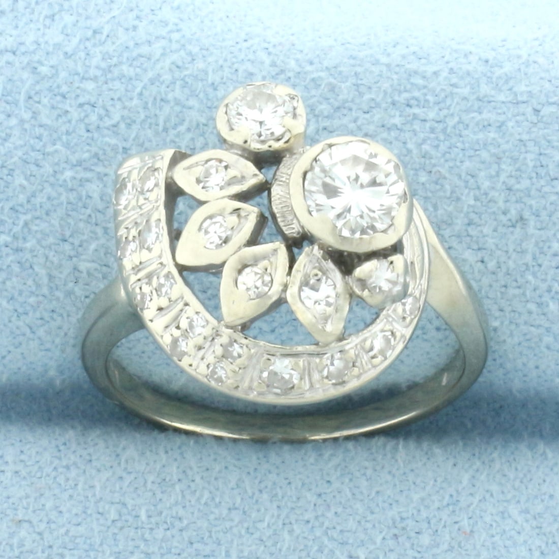 Vintage Diamond Retro Art Deco Ring in 14k White Gold: In 14k White Gold. Contains one 1/2 ct, one 1/5ct, twelve .02ct and six .01ct high quality diamonds, VS clarity/G color. 1ct TW. Size 7. 4.5g.