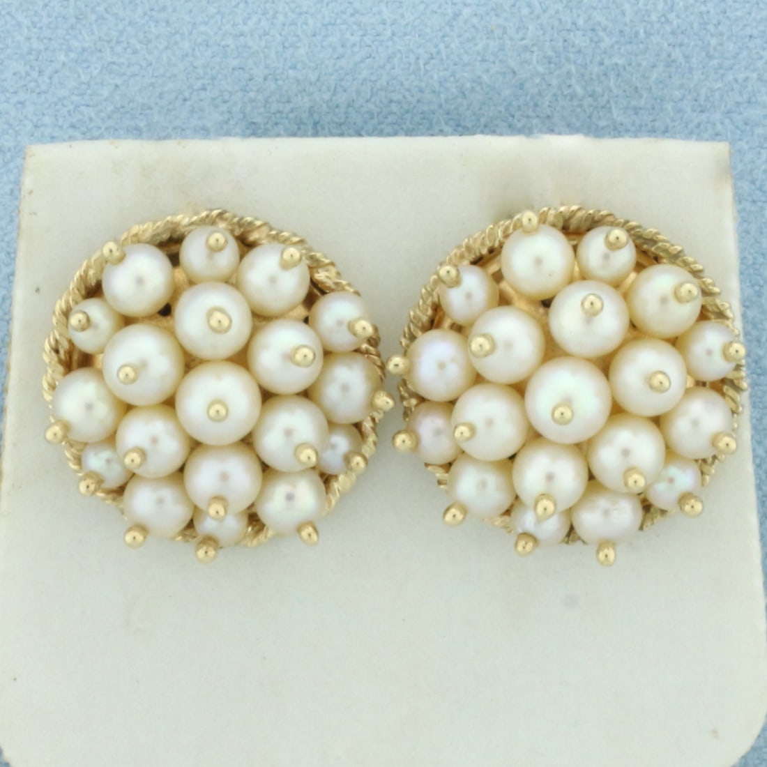 Vintage Pearl Pincushion Button Earrings in 14k Yellow Gold: In 14k yellow gold. 19mm diameter. Contains 38 high quality cultured pearls, 3.5-5mm each, with high luster. Friction backs. 8.3g.