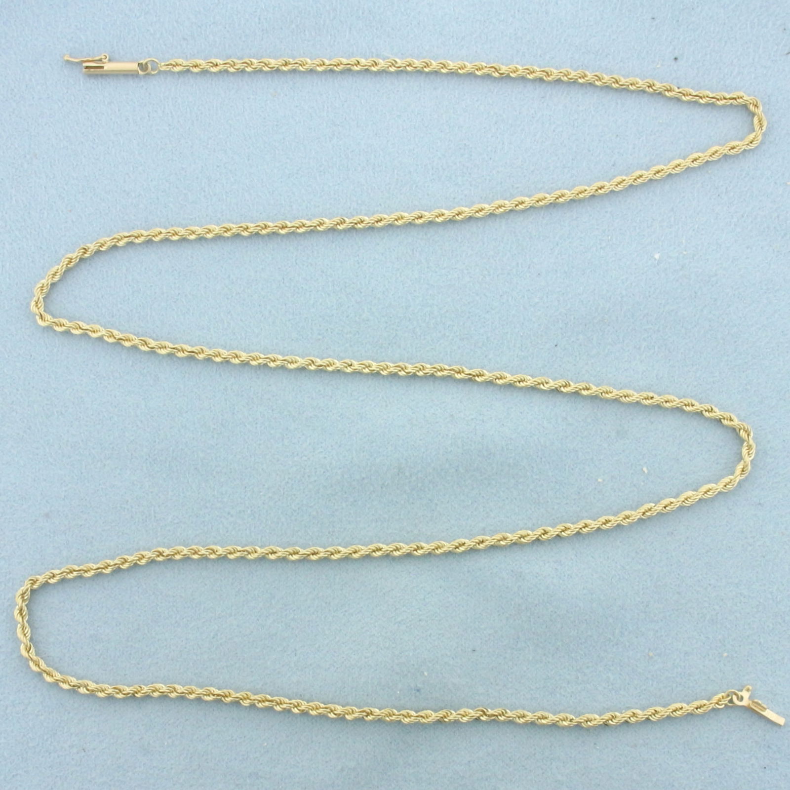 24 Inch Rope Link Chain Necklace in 14k Yellow Gold: In 14k Yellow Gold. 24 inch long. 2.2mm inch wide. Barrel clasp with safety latch. 10.8g.