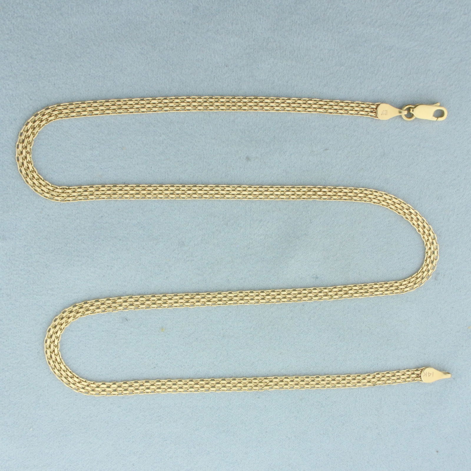 20 Inch Bismark Link Chain Necklace in 14k Yellow Gold: In 14k Yellow Gold. 20 inches long. 4mm wide. Lobster clasp. 9.2g.
