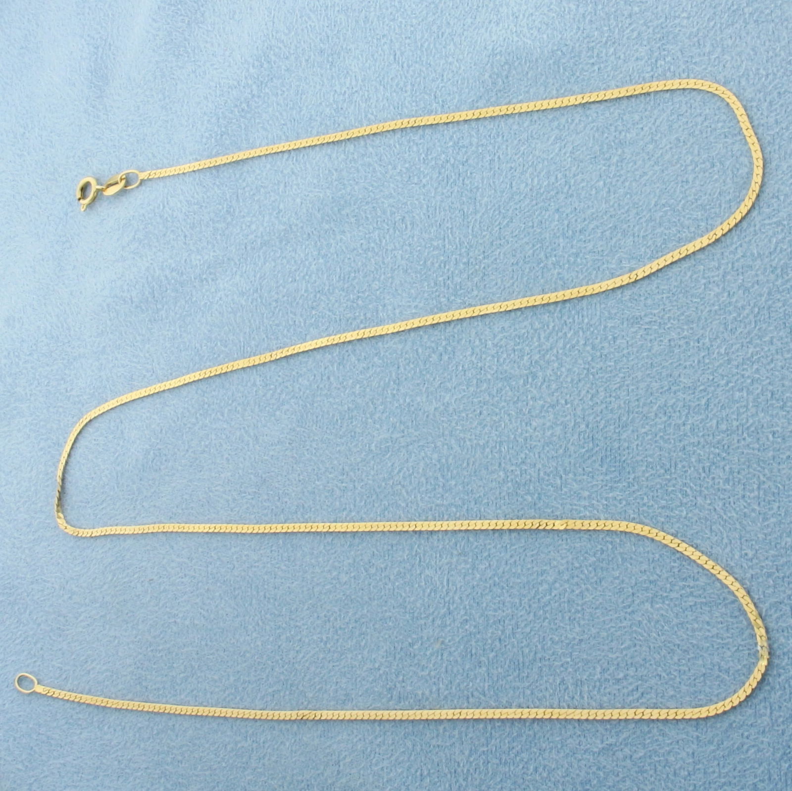 Italian 20 Inch Herringbone Link Chain Necklace in 14k Yellow Gold: In 14k Yellow Gold. 20 inches long. 1.2mm wide. Made in Italy. Spring clasp. 2.2g.