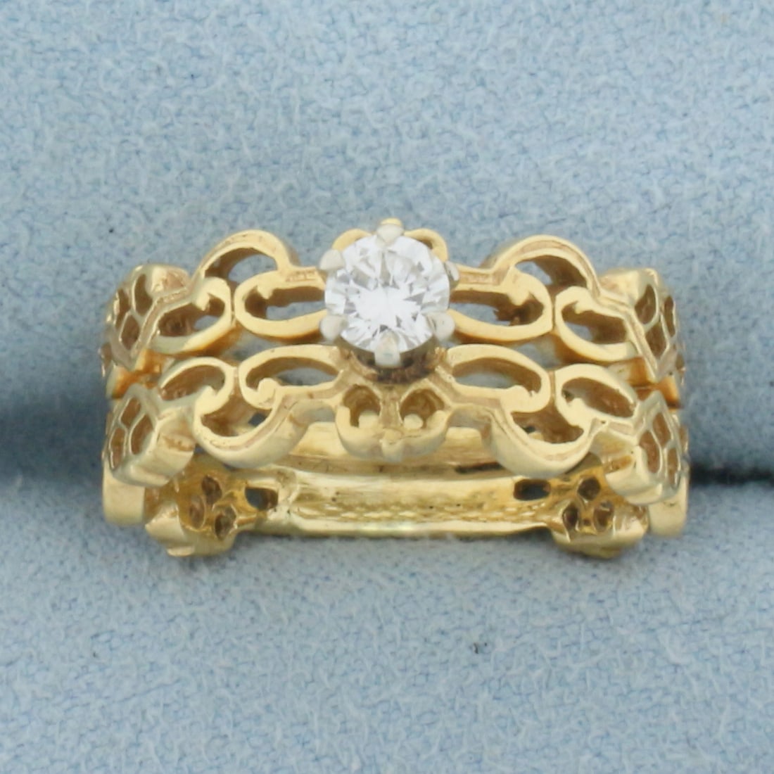 Unique Diamond Cut Out Design Engagement Ring in 18K Yellow Gold: In 18K Yellow Gold. Contains one high quality 1/5ct Diamond, VS clarity/H color. Size 5 1/2. 5.5g
