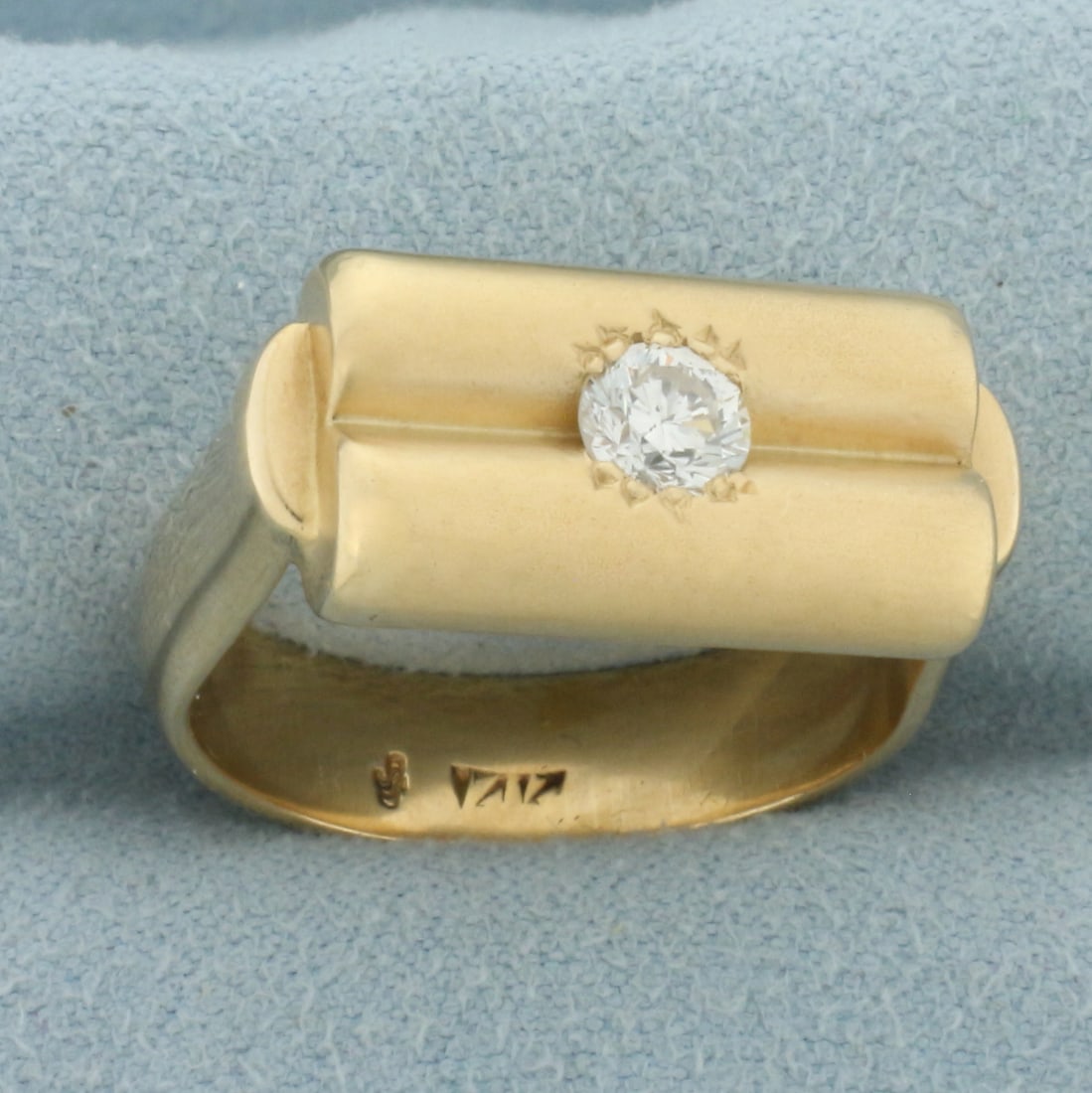 Unique Diamond Double Cylinder Design Ring in 14k Yellow Gold: In 14k yellow gold. Contains one high quality 1/3ct round brilliant cut diamond, SI clarity/H color. Head of ring 18mm long by 10mm wide. Size: 8.5. 14.3g.