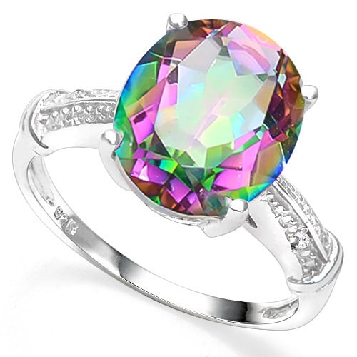 Large Mystic Topaz and Diamond Ring in Sterling Silver: In platinum over .925 sterling silver. Contains one mystic topaz gemstone, 3.2cts, accented with two genuine diamonds, .01ctw. Size 7. 3.2g