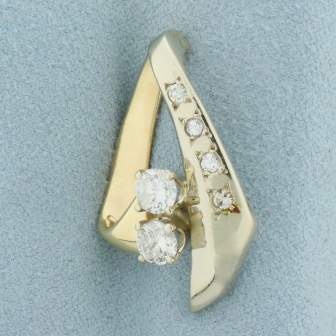 Diamond Pendant or Slide in 14k Yellow and White Gold: In 14k Yellow and White Gold. Contains two .35ct and four .02ct high quality diamonds, SI to I clarity/H color. 1 1/8 inch long. 5/8 inch wide. 5.3g.