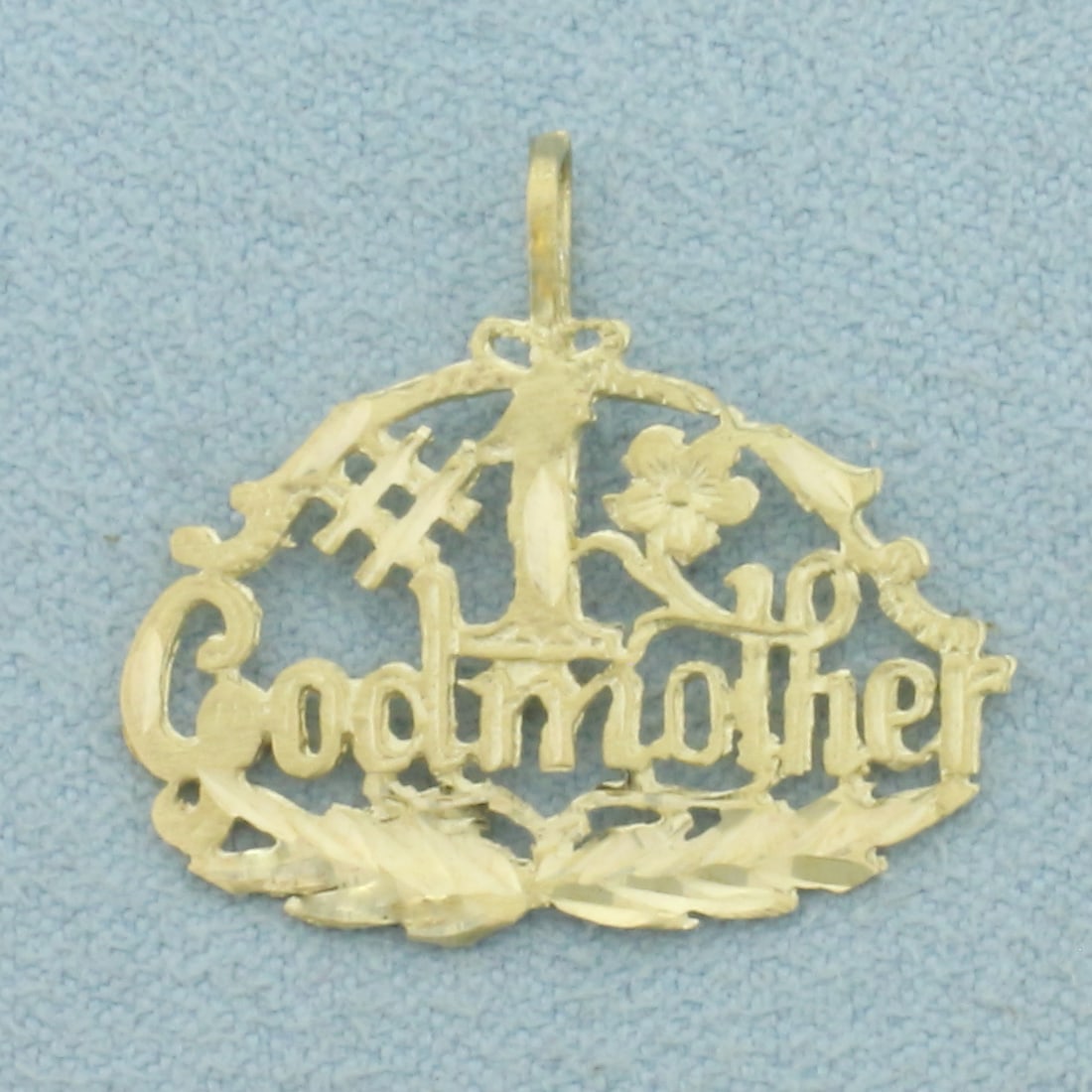 Number One #1 Godmother Pendant in 14k Yellow Gold: In 14k Yellow Gold. 7/8 inch long (including bale). 7/8 inch wide. 1.2g.