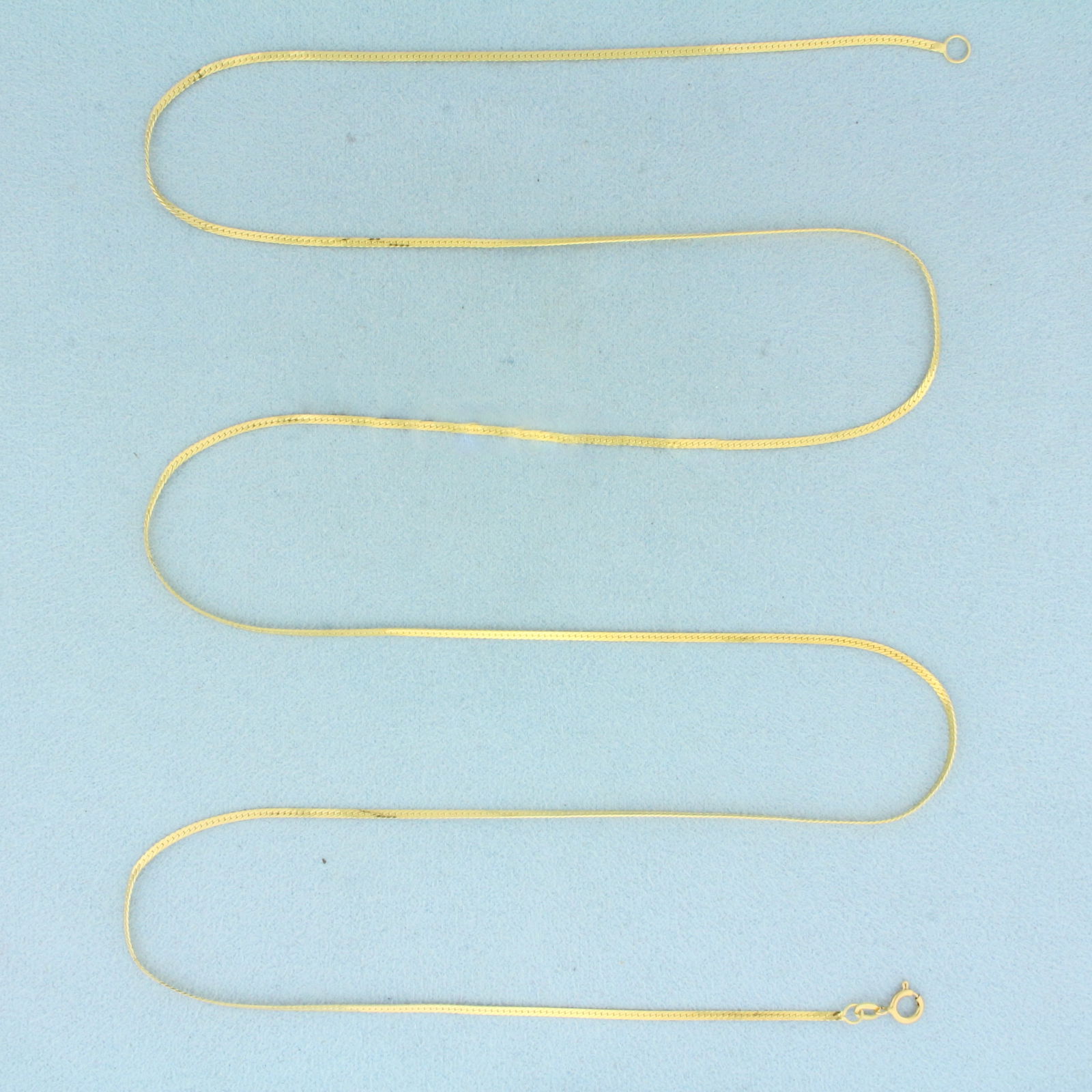 Italian 30 Inch Herringbone Link Chain Necklace in 14k Yellow Gold: In 14k Yellow Gold. 30 inches long. 1.3mm wide. Made in Italy. Spring clasp. 3.6g.